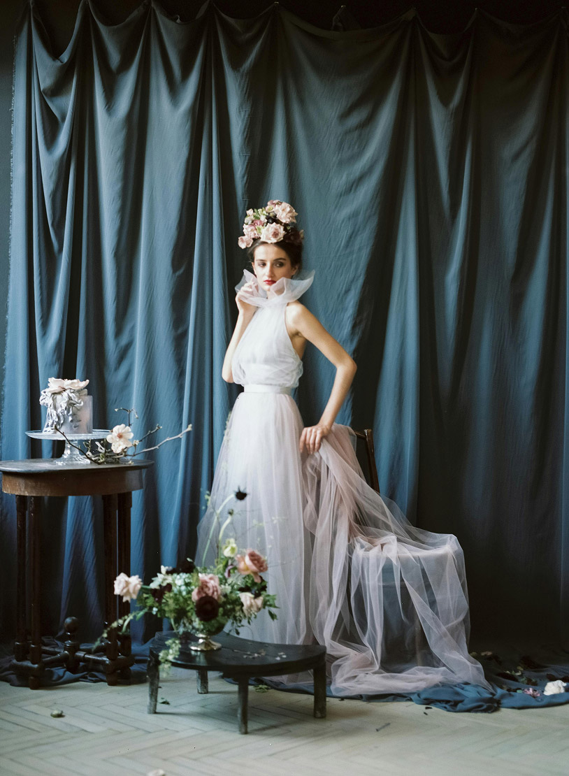 Model wearing a white gown