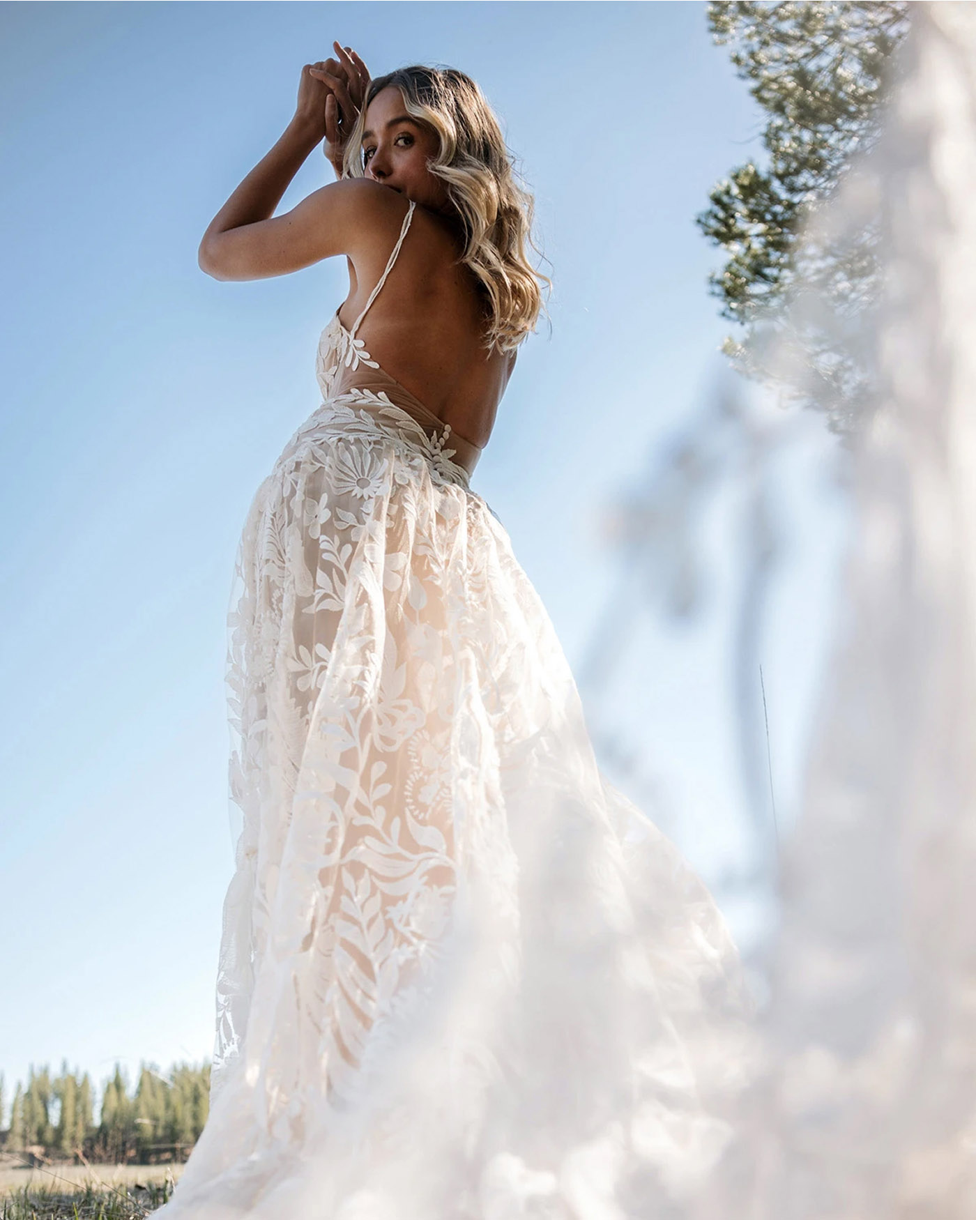 Photo of the model wearing a bridal gown