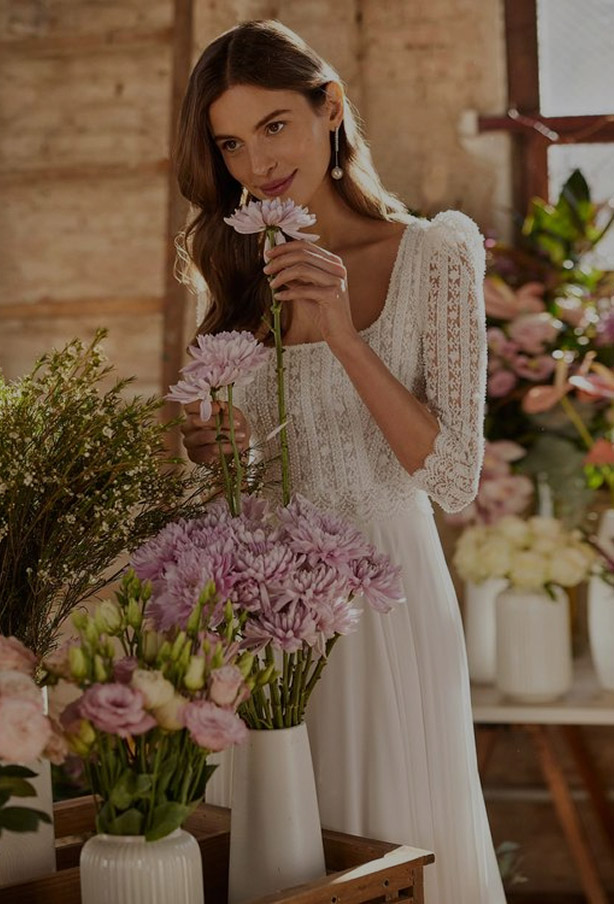 Photo of the model wearing a white gown